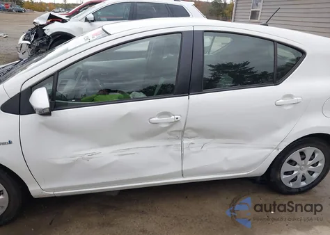 2014 Toyota Prius C Two z USA, uszkodzony, nr VIN JTDKDTB36E1566705